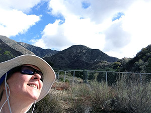 Laurie evaluates the storm clouds before hiking