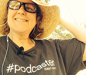 Laurie wears her Podcaster Shirt from the NMX conference
