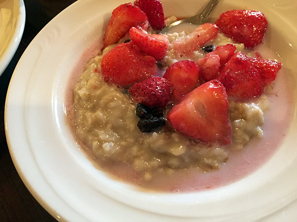 Bowl of oatmeal with strawberries
