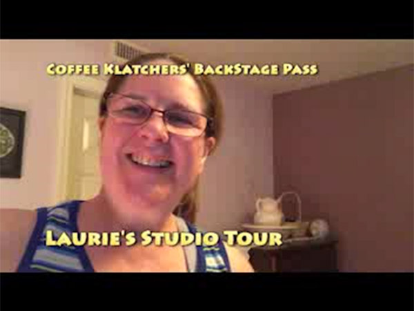 Laurie in her guest room with the caption, Coffee Klatchers' Backstage Pass - Laurie's Studio Tour