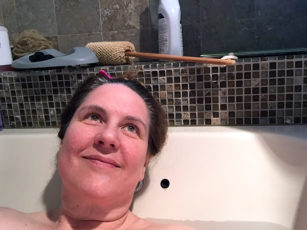 Laurie looking dreamy in a bathtub